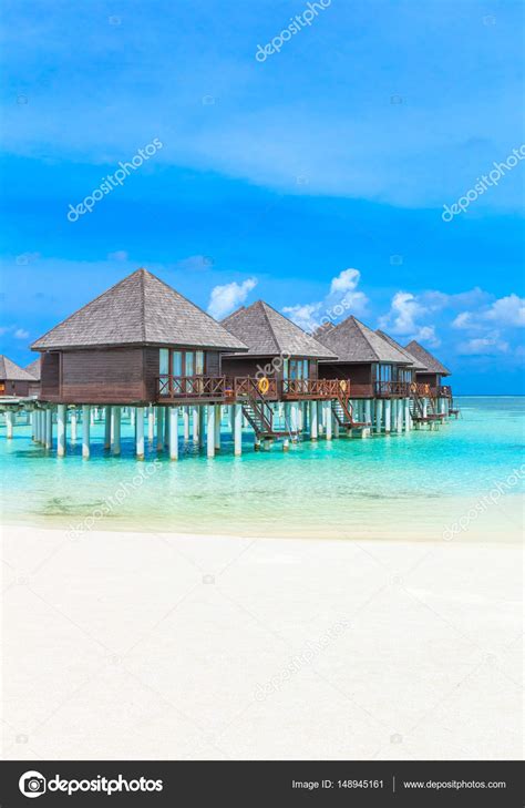 Tropical beach in Maldives Stock Photo by ©Pakhnyushchyy 148945161