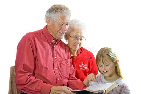 Grandparents Reading To Grandchild Stock Photo Image Of Aged Teach