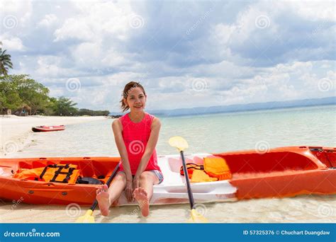 Beautiful Girl With Kayak Paddle Travel And Vacation On The Bea Stock