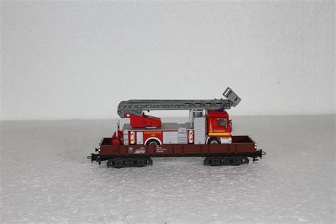 Märklin DB Niederbordwagen mit Feuerwehr Drehleiter Kaufen auf Ricardo