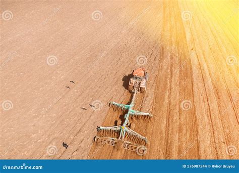 Top View Of Tractor Planting Corn Seed In Field Stock Image