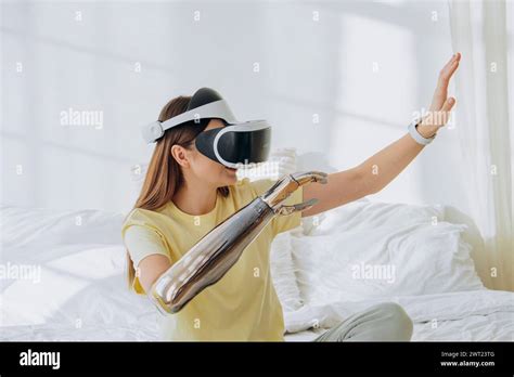 A Woman Explores Virtual Reality Wearing A Vr Headset And Interacting