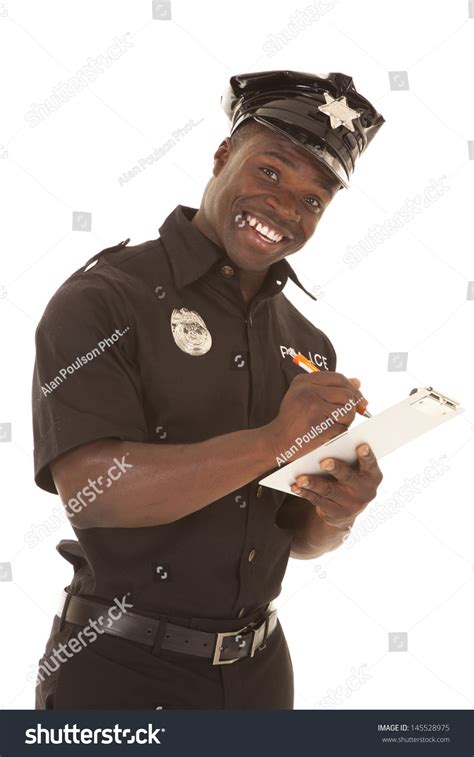 Policeman Writing Ticket While Smiling Stock Photo 145528975 Shutterstock