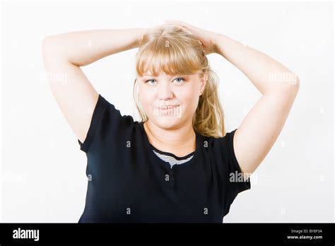 Cute Chubby Blonde Posing On A White Background Stock Photo Alamy