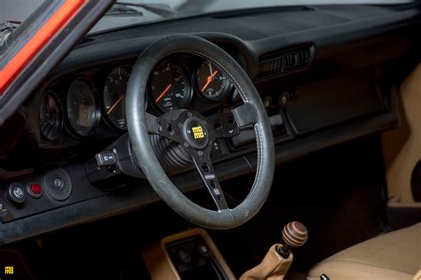 Guards Red Porsche 930 Turbo Slantnose Momo Heritage Prototipo Steering Wheel In Black Momo