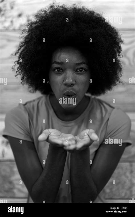 Portrait Of Cute African American Woman With Afro Hairstyle While