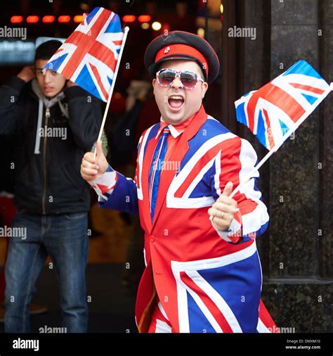 Man wearing an Union Jack suit outside a tourist shop in London Stock Photo - Alamy