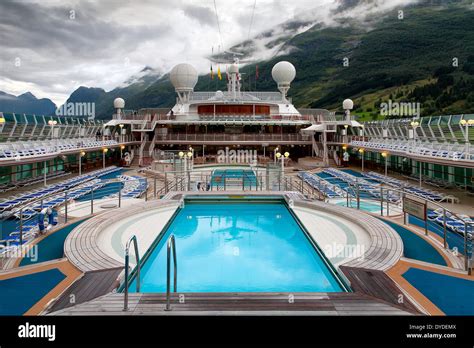 Cruise Ship Swimming Pool And Mountains Stock Photo Alamy