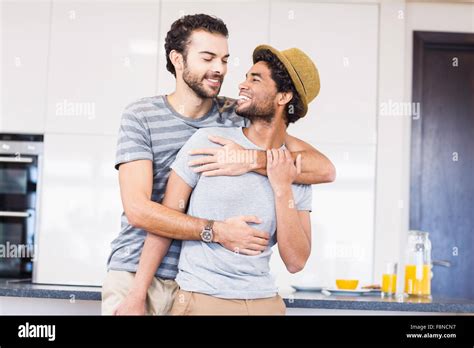 Happy Gay Couple Hugging Stock Photo Alamy