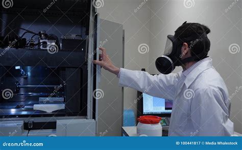 Male Scientist In A Gas Mask In Laboratory Editorial Photography