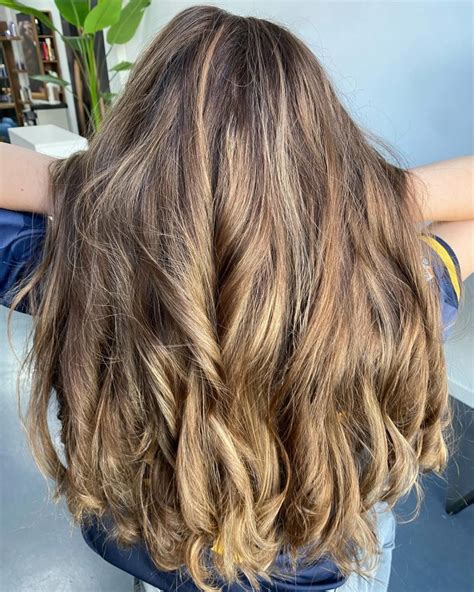 21 Brown Blonde Hair Ideas For 2024 Embrace Stunning Balayage Highlights And Curls Styles