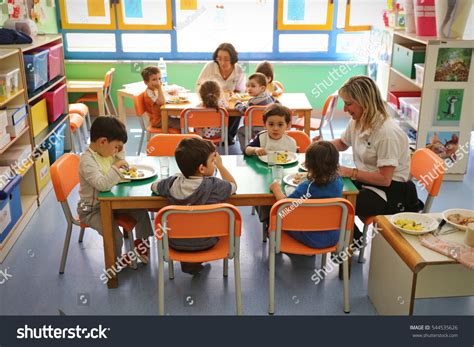 A Preschool Cafeteria Manager Protects Young Children's Health By Serving