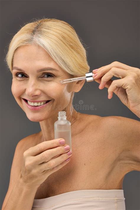 Good Looking Mature Woman Applying Serum Stock Image Image Of