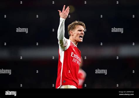 Arsenals Martin Odegaard Encourages His Team Mates And Fans During The