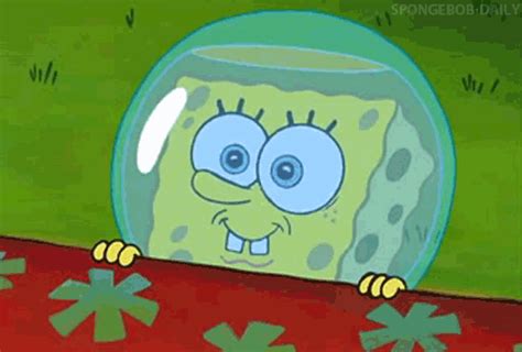 An Animated Spongebob Character Is Peeking Out From Behind A Table