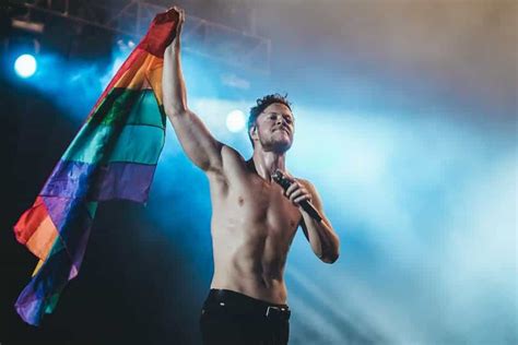 Imagine Dragons Dan Reynolds Strips Down With Rainbow Flag Embrace Our Sexual Diversity