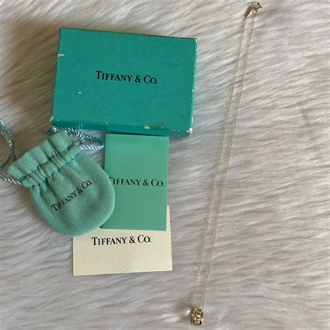 Authentic Preloved Tiffany Co Atlas Roman Numeral Pendant Necklace