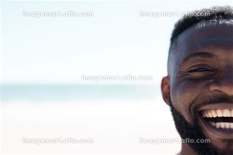 Cropped Face Of African American Mid Adult Bearded Man Laughing At