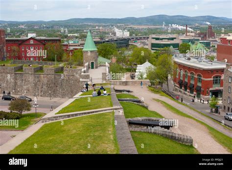 People Resting And Enjoying A Warm Day On The Ramparts Of Quebec City