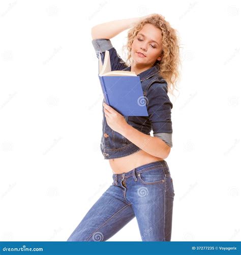 Denim Fashion College Student Girl In Blue Jeans Reading Book Stock