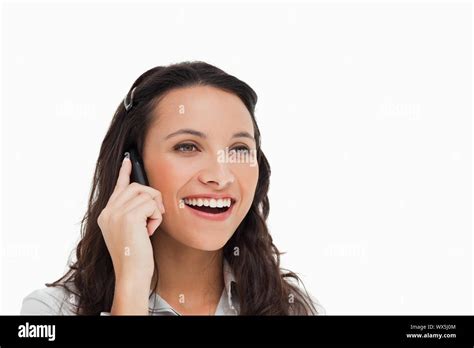 Happy Brunette Phoning Against White Background Stock Photo Alamy