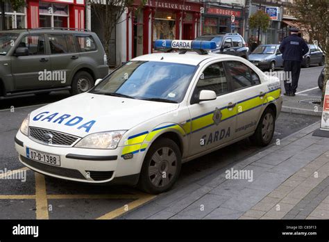 An Garda Siochana Irish Police Patrol Squad Car With Police Officer In