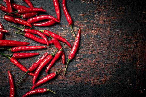 Premium Photo A Bunch Of Hot Chili Pepper Pods