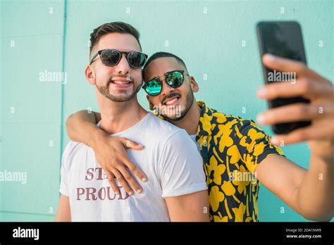 Gay Couple Taking A Selfie With Mobile Phone Stock Photo Alamy