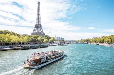 Paris: Seine Cruise and Eiffel Tower District Walking Tour | GetYourGuide