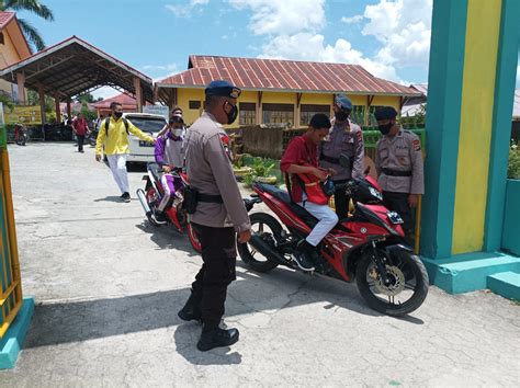 Pandemi Belum Berakhir Personel Satbrimob Gorontalo Lakukan