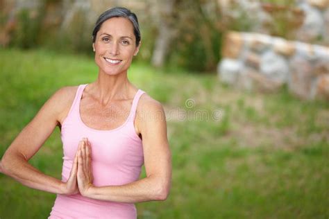 Finding A Moment Of Calm Portrait Of An Attractive Mature Woman Doing