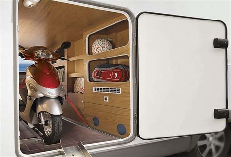 Scooter Dans La Soute Garage Dun Camping Car Camping Camping Car