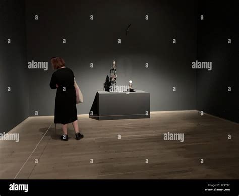 Woman in art gallery Stock Photo - Alamy