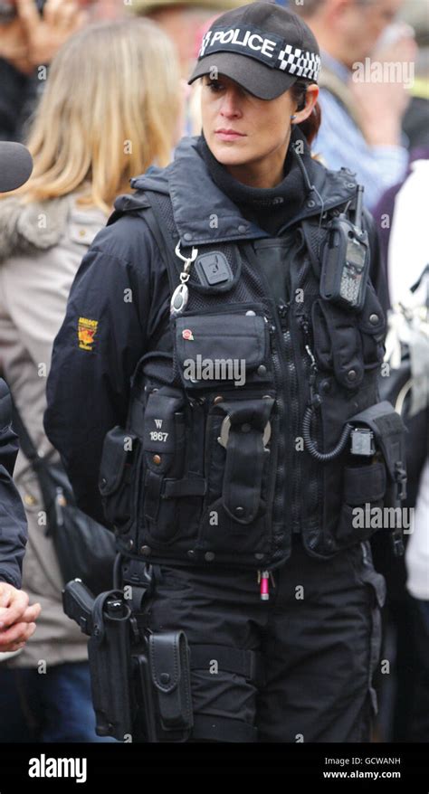 Armed Female Police Officer On Duty In Salisbury Wiltshire Stock