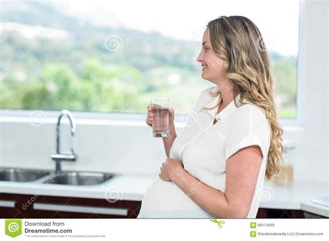 Pregnant Woman Drinking A Glass Of Water Stock Image Image Of Glass Joyful 66174569