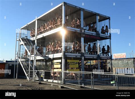 Munich Germany 14th Dec 2013 Numerous Nude People Stand In A Cage At The Tollwood Winter