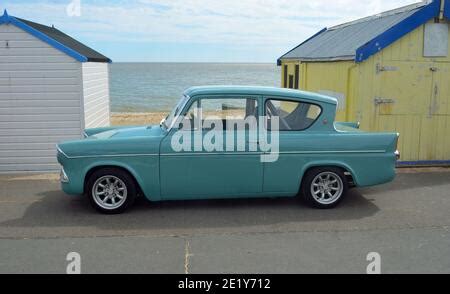 Blue Ford Anglia restored classic British motorcar Stock Photo - Alamy