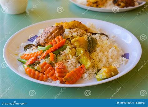 Sri Lankan Rice and Curry Dish Stock Photo - Image of herb, chopped ...