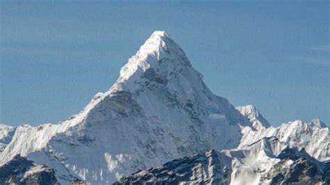nepali climber scales worlds  highest peaks   days world news