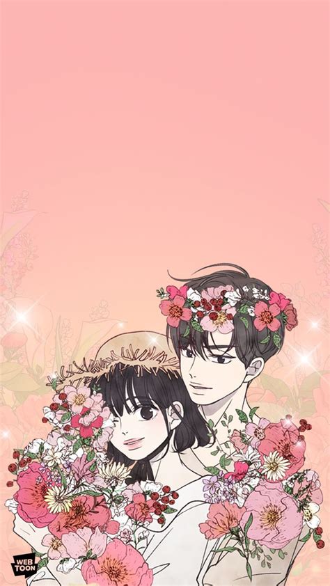 Two People With Flowers In Their Hair