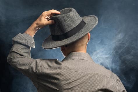 Premium Photo Middleaged Man With A Beard Wearing A Hat And Posing