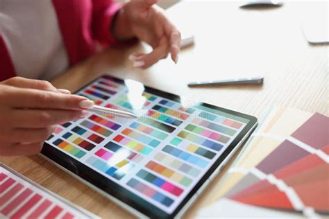 Color Palette With Different Shades And Tablet On Table Stock Photo