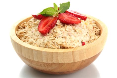 Premium Photo Tasty Oatmeal With Strawberries Isolated On White