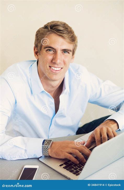 Professional Young Man Working On Laptop Computer Stock Photo Image