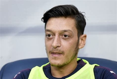 ozil omitted  arsenals premier league squad  citizen