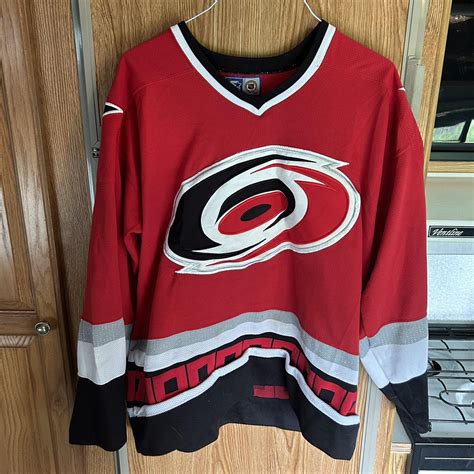 Carolina Hurricanes ice hockey jersey. Size large!... - Depop