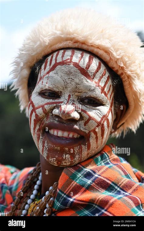 Kikuyu Woman With Face Paint Poses For Photographers At Nyahururu Falls