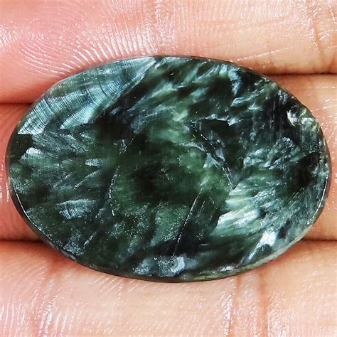 A Quality Natural Green Seraphinite Cts Oval Cabochon X X Mm