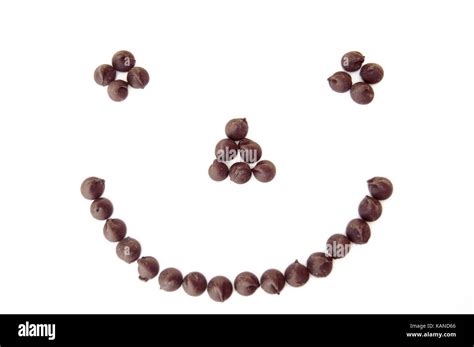 A Smiling Chocolate Chip Face On A White Background Stock Photo Alamy