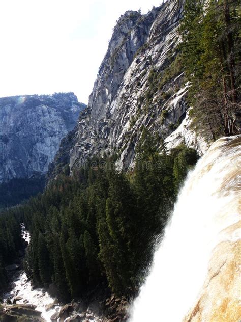 View Over The Edge Of Vernal Falls With Rainbow Waterfall In Yosemite